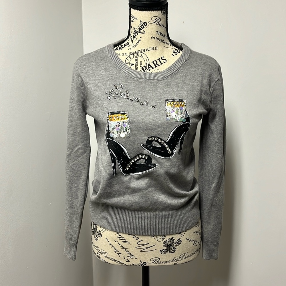 Embellished long sleeve crew neck sweater